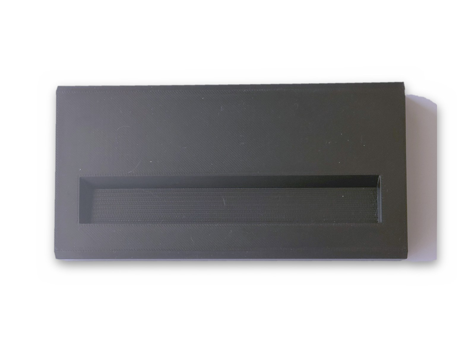 The display base, showing the slot that takes the frame